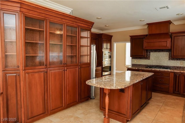 2208 Fiero Dr, Las Vegas, NV 89134 - kitchen with appliances with stainless steel finishes, a center island, custom range hood, light tile patterned floors, and crown molding