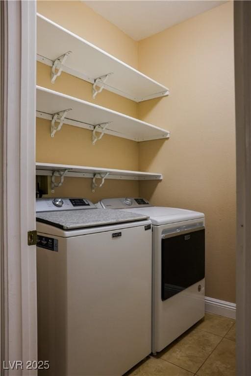 2208 Fiero Dr, Las Vegas, NV 89134 - washroom with independent washer and dryer and light tile patterned flooring