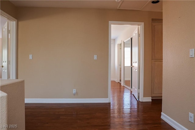 2208 Fiero Dr, Las Vegas, NV 89134 - empty room featuring dark wood-type flooring and baseboards