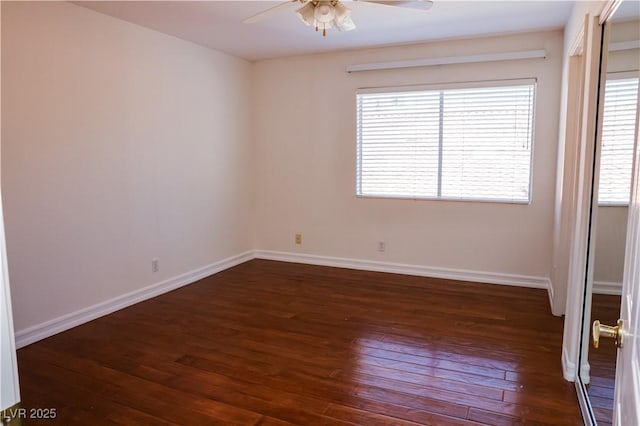 2208 Fiero Dr, Las Vegas, NV 89134 - empty room with a ceiling fan and dark wood-type flooring