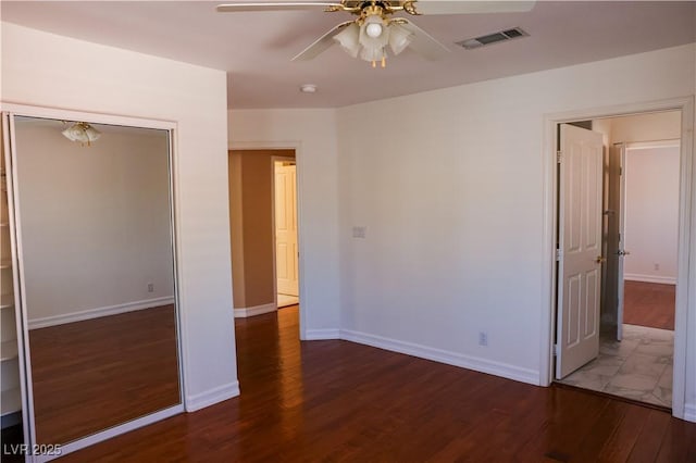 2208 Fiero Dr, Las Vegas, NV 89134 - spare room with wood finished floors, a ceiling fan, and a smoke detector