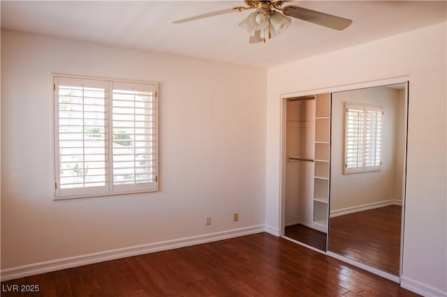 2208 Fiero Dr, Las Vegas, NV 89134 - unfurnished bedroom with a closet, wood finished floors, and a ceiling fan