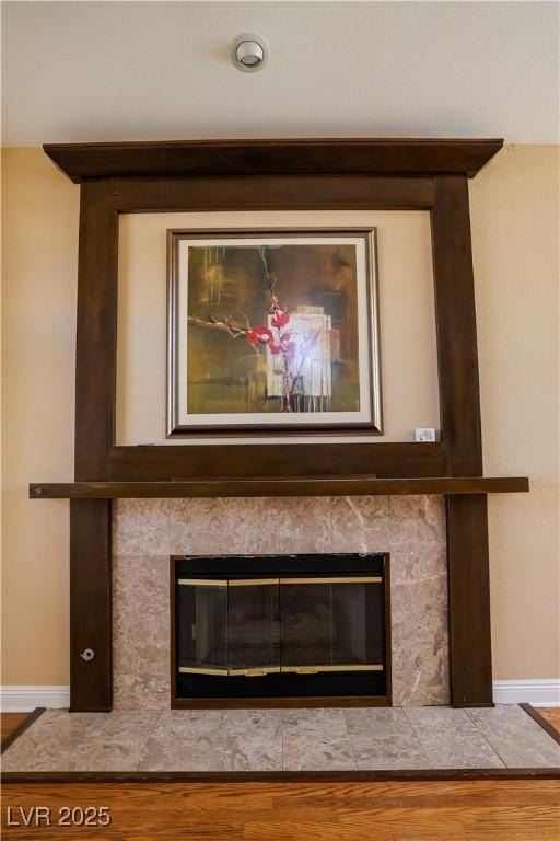 2208 Fiero Dr, Las Vegas, NV 89134 - detailed view of wood finished floors and a tile fireplace