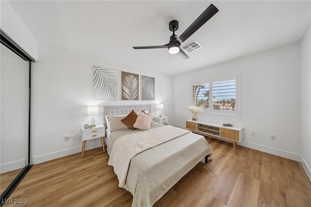 9900 Summer Ash Ct Unit 103, Las Vegas, NV 89134 - bedroom with light wood-style floors and a ceiling fan