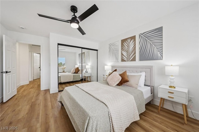 9900 Summer Ash Ct Unit 103, Las Vegas, NV 89134 - bedroom featuring light wood-style floors, a closet, and a ceiling fan
