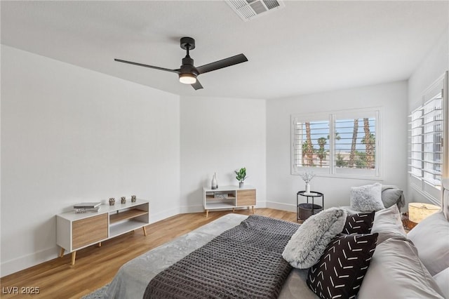 9900 Summer Ash Ct Unit 103, Las Vegas, NV 89134 - bedroom featuring wood finished floors and a ceiling fan