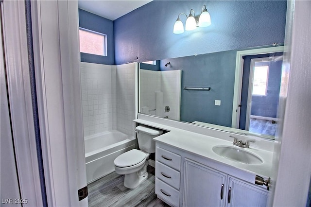 6042 Thorne Bay Ct, Las Vegas, NV 89110 - bathroom featuring healthy amount of natural light, vanity, wood finished floors, and shower / bath combination