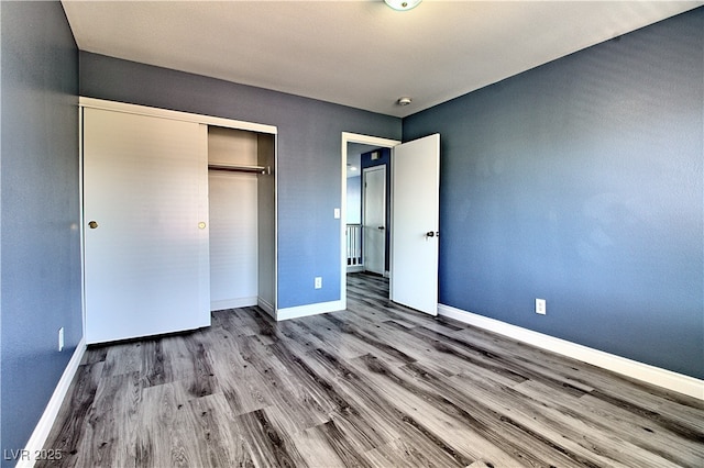 6042 Thorne Bay Ct, Las Vegas, NV 89110 - unfurnished bedroom featuring wood finished floors and a closet