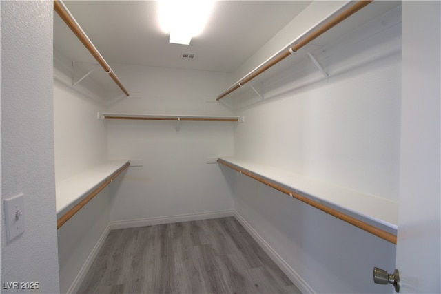 6042 Thorne Bay Ct, Las Vegas, NV 89110 - walk in closet featuring light wood finished floors