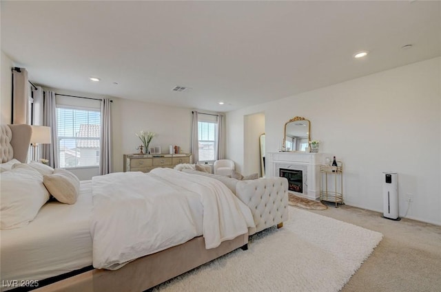 2940 Duverney Ave, Henderson, NV 89044 - bedroom featuring light colored carpet, recessed lighting, and a high end fireplace