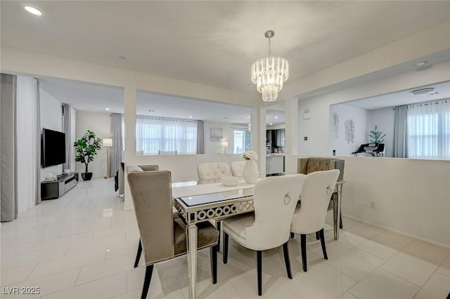 2940 Duverney Ave, Henderson, NV 89044 - dining space with a chandelier, healthy amount of natural light, light tile patterned floors, and recessed lighting