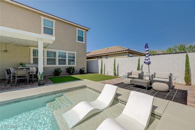 2940 Duverney Ave, Henderson, NV 89044 - view of swimming pool featuring outdoor lounge area, a fenced backyard, and a patio area