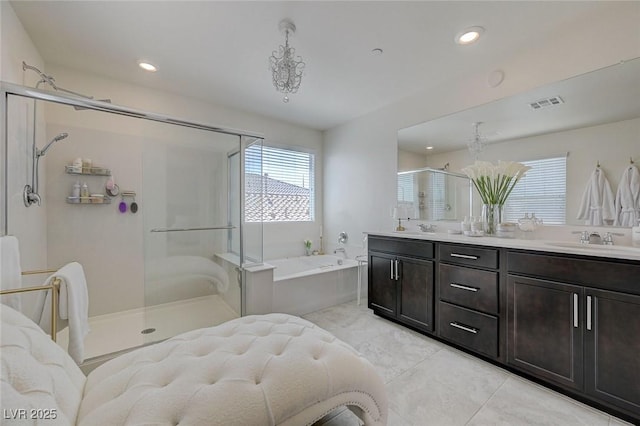 2940 Duverney Ave, Henderson, NV 89044 - bathroom featuring a bath, a stall shower, double vanity, tile patterned floors, and recessed lighting
