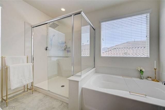 2940 Duverney Ave, Henderson, NV 89044 - bathroom featuring a bath, a stall shower, and recessed lighting
