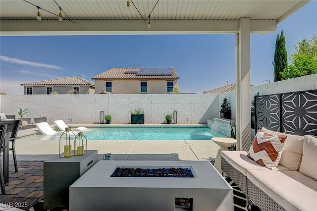 2940 Duverney Ave, Henderson, NV 89044 - view of swimming pool featuring an outdoor living space with a fire pit, a patio area, and a fenced backyard