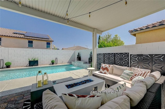 2940 Duverney Ave, Henderson, NV 89044 - view of swimming pool featuring an outdoor living space with a fire pit, a fenced backyard, and a patio