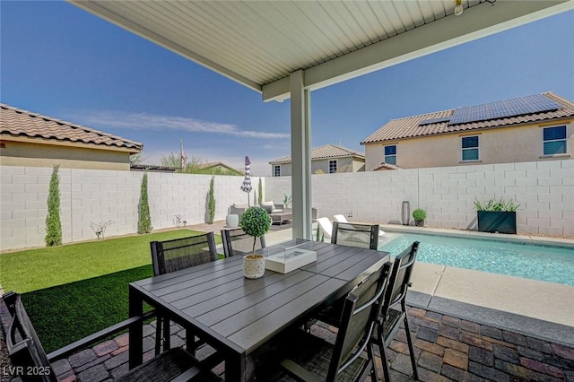 2940 Duverney Ave, Henderson, NV 89044 - fenced backyard with a patio and outdoor dining area