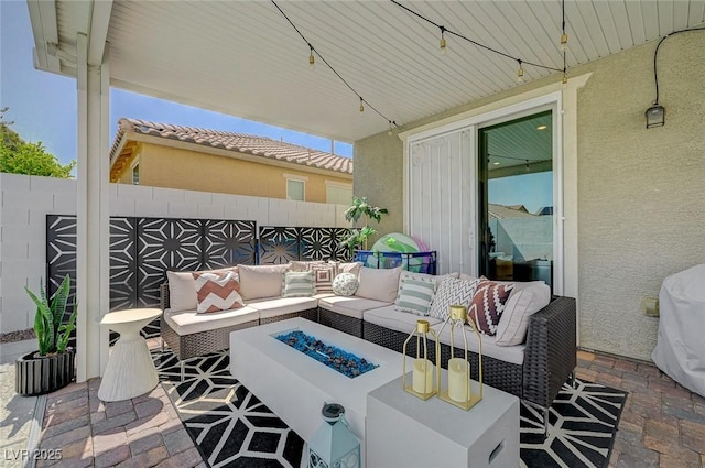 2940 Duverney Ave, Henderson, NV 89044 - fenced backyard featuring an outdoor living space with a fire pit and a patio