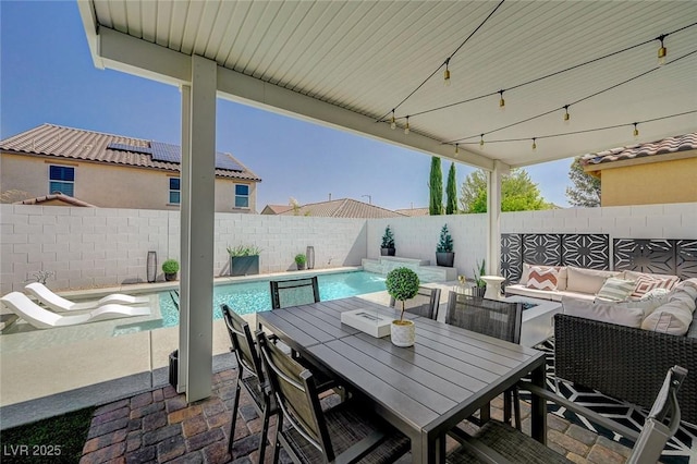 2940 Duverney Ave, Henderson, NV 89044 - fenced backyard with an outdoor hangout area and a patio area