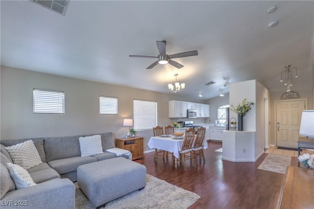 5687 Harbour Pointe Ave, Las Vegas, NV 89122 - living area featuring plenty of natural light, a ceiling fan, and wood finished floors