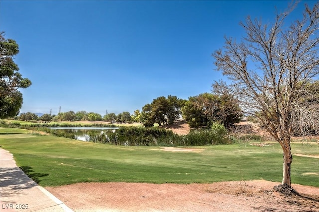 5687 Harbour Pointe Ave, Las Vegas, NV 89122 - view of home's community featuring a water view, golf course view, and a lawn