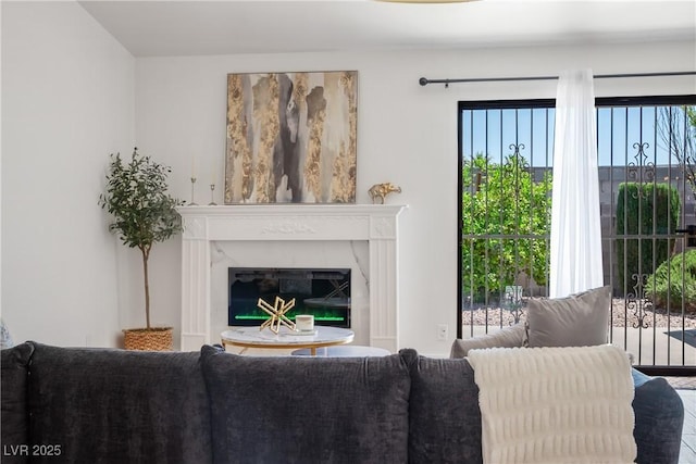 4774 Walteta Way, Las Vegas, NV 89119 - living area with a glass covered fireplace