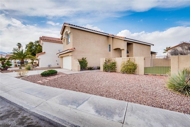 7816 Calico Flower Ave, Las Vegas, NV 89128 - view of side of property with an attached garage, stucco siding, concrete driveway, and a tile roof
