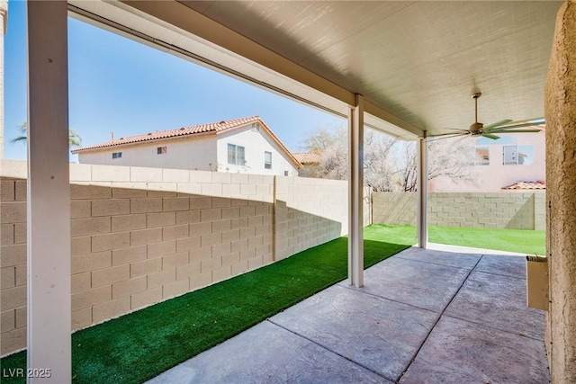 7816 Calico Flower Ave, Las Vegas, NV 89128 - fenced backyard featuring ceiling fan and a patio area