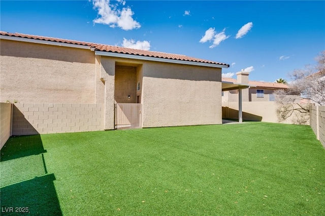 7816 Calico Flower Ave, Las Vegas, NV 89128 - back of property featuring a fenced backyard and stucco siding