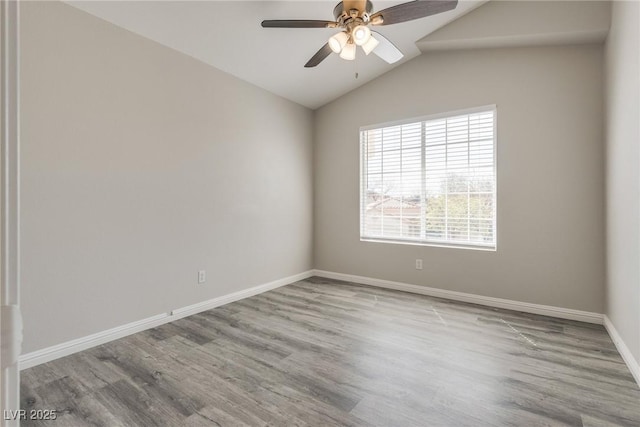 7816 Calico Flower Ave, Las Vegas, NV 89128 - unfurnished room featuring wood finished floors, vaulted ceiling, and ceiling fan