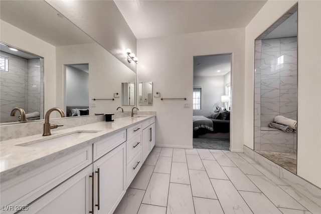 32 Tatahatso Point St, Henderson, NV 89011 - ensuite bathroom with marble finish floors, double vanity, and a marble finish shower