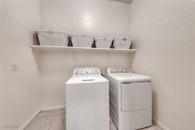 32 Tatahatso Point St, Henderson, NV 89011 - laundry room with washer and clothes dryer and light tile patterned floors