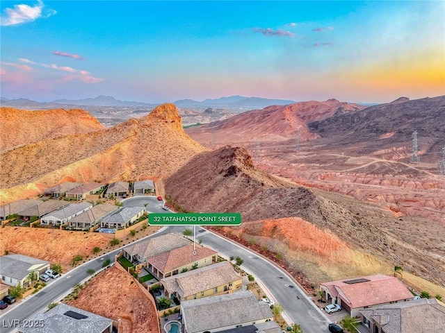 32 Tatahatso Point St, Henderson, NV 89011 - aerial view of property's location with a mountain backdrop and nearby suburban area