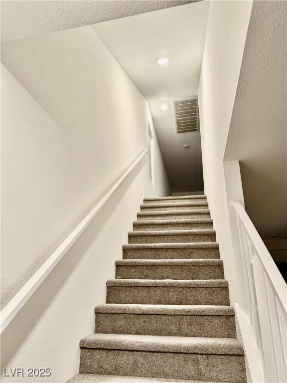 10411 Rose Palisade St, Las Vegas, NV 89141 - stairway featuring recessed lighting
