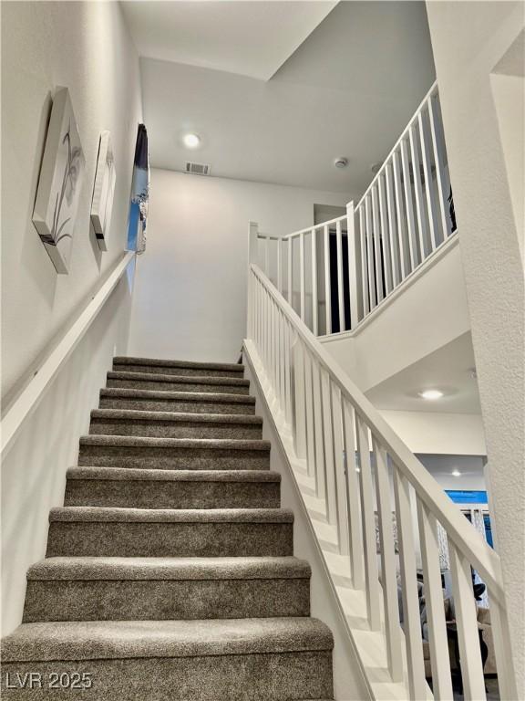 10411 Rose Palisade St, Las Vegas, NV 89141 - stairway with recessed lighting