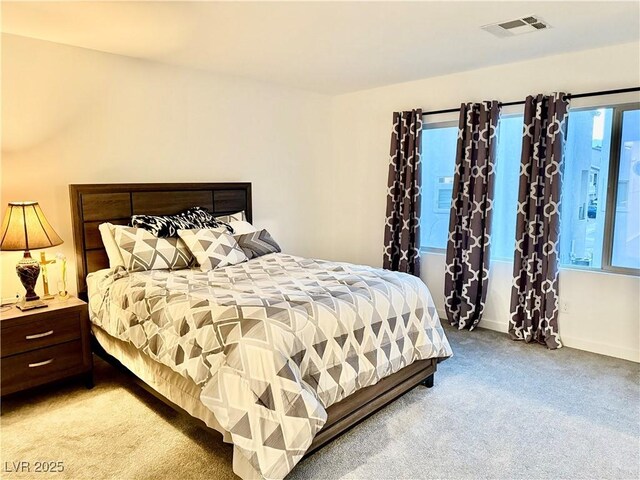 10411 Rose Palisade St, Las Vegas, NV 89141 - bedroom with light carpet and baseboards