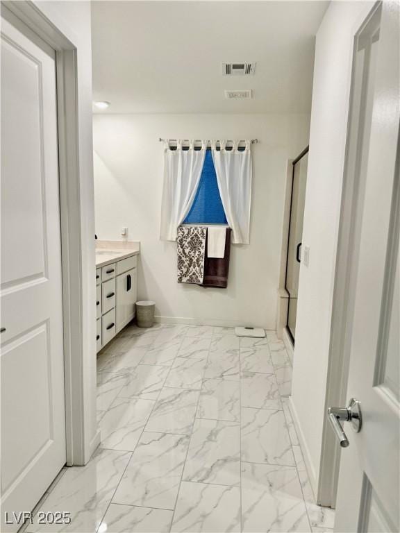 10411 Rose Palisade St, Las Vegas, NV 89141 - full bath featuring marble look tiles, vanity, and a stall shower
