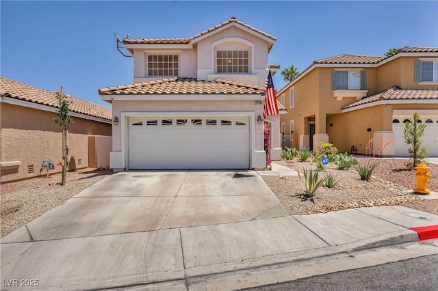 2180 Polynesia Cir, Henderson, NV 89074 - mediterranean / spanish house with a tile roof, stucco siding, and driveway