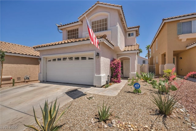 2180 Polynesia Cir, Henderson, NV 89074 - mediterranean / spanish-style house with stucco siding, a tile roof, and concrete driveway
