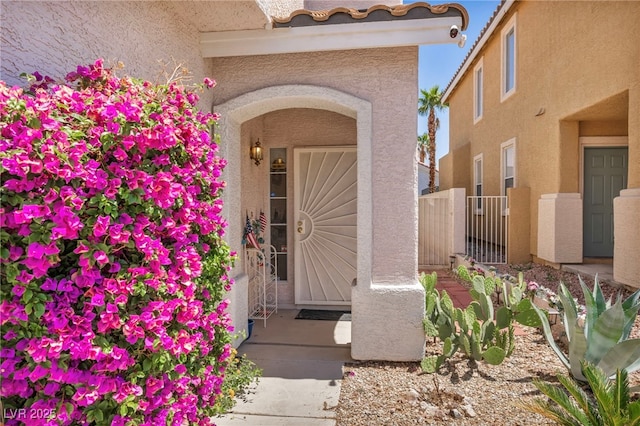 2180 Polynesia Cir, Henderson, NV 89074 - doorway to property with stucco siding