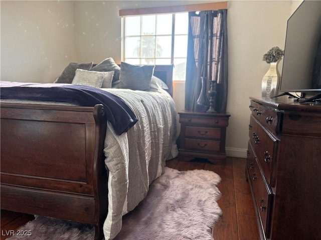 2180 Polynesia Cir, Henderson, NV 89074 - bedroom featuring dark wood-style floors and baseboards