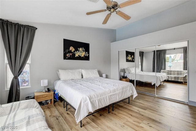8926 Termoli St, Las Vegas, NV 89123 - bedroom featuring lofted ceiling, light wood-type flooring, a closet, and a ceiling fan