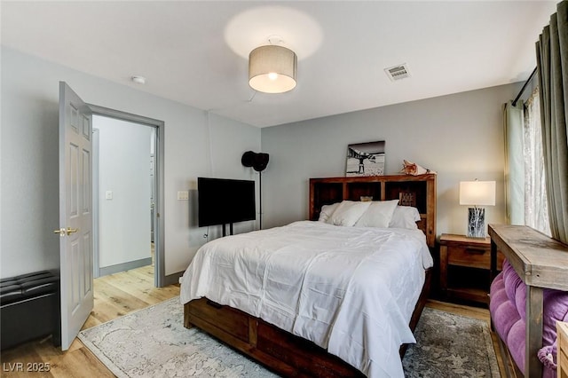 8926 Termoli St, Las Vegas, NV 89123 - bedroom featuring light wood-style flooring