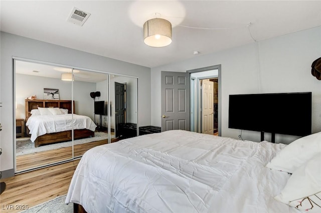 8926 Termoli St, Las Vegas, NV 89123 - bedroom with wood finished floors and a closet