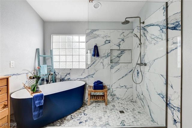 8926 Termoli St, Las Vegas, NV 89123 - full bath featuring a soaking tub, a tile shower, tile walls, and vanity