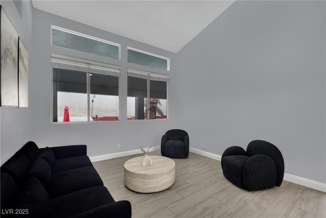 5509 Rose Thicket St, Las Vegas, NV 89130 - living room with wood finished floors and high vaulted ceiling