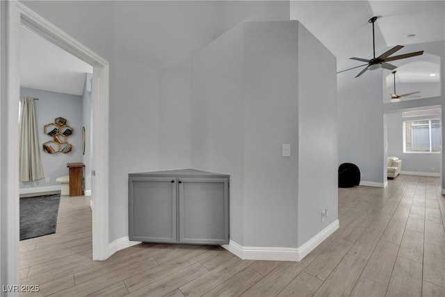 5509 Rose Thicket St, Las Vegas, NV 89130 - corridor featuring light wood-type flooring and high vaulted ceiling