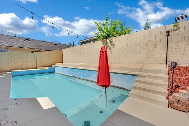 5509 Rose Thicket St, Las Vegas, NV 89130 - view of swimming pool featuring a fenced backyard and a patio