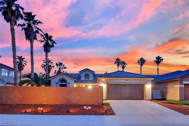 5509 Rose Thicket St, Las Vegas, NV 89130 - ranch-style home with concrete driveway, a garage, and stucco siding