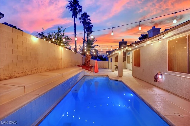 5509 Rose Thicket St, Las Vegas, NV 89130 - view of pool featuring a fenced backyard and a patio